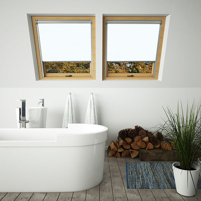 Waterproof Blinds: Skylight blinds in a white bathroom above a bath