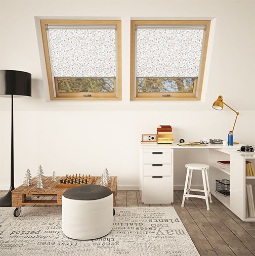 A photo of a converted office room with two skylight windows and blinds