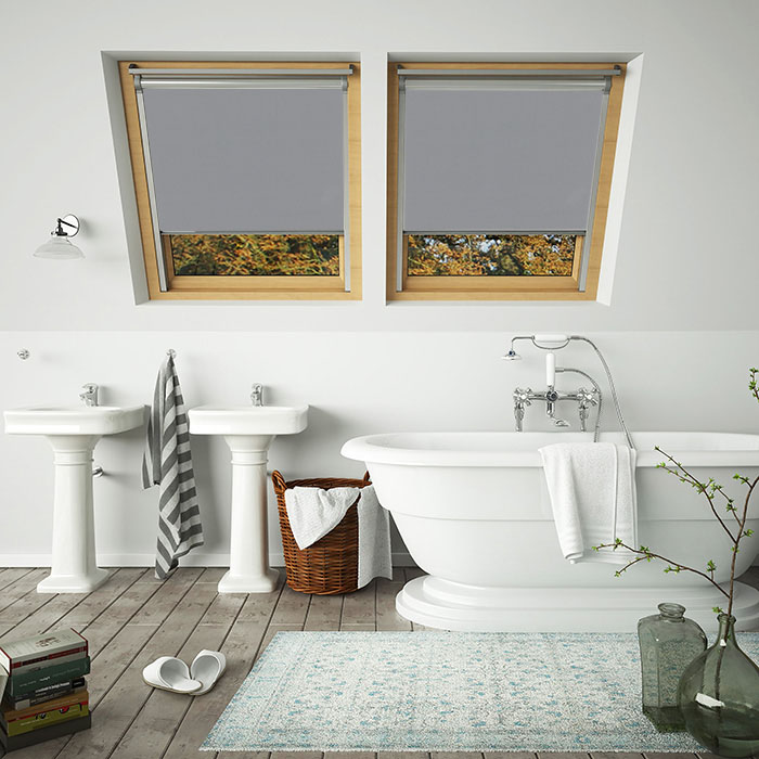 An image of grey showerproof 100% waterproof skylight VELUX compatible blinds in a bathroom